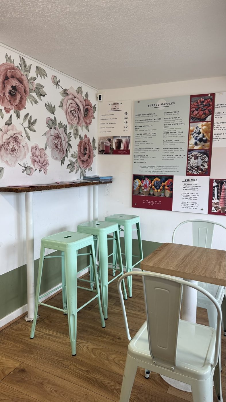 Seats and a window counter inside the café